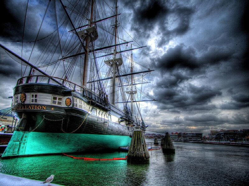 Historic ship in a stormy harbor
