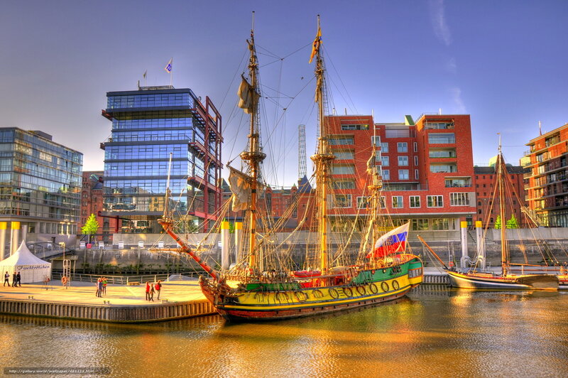 Historic ship in modern harbor