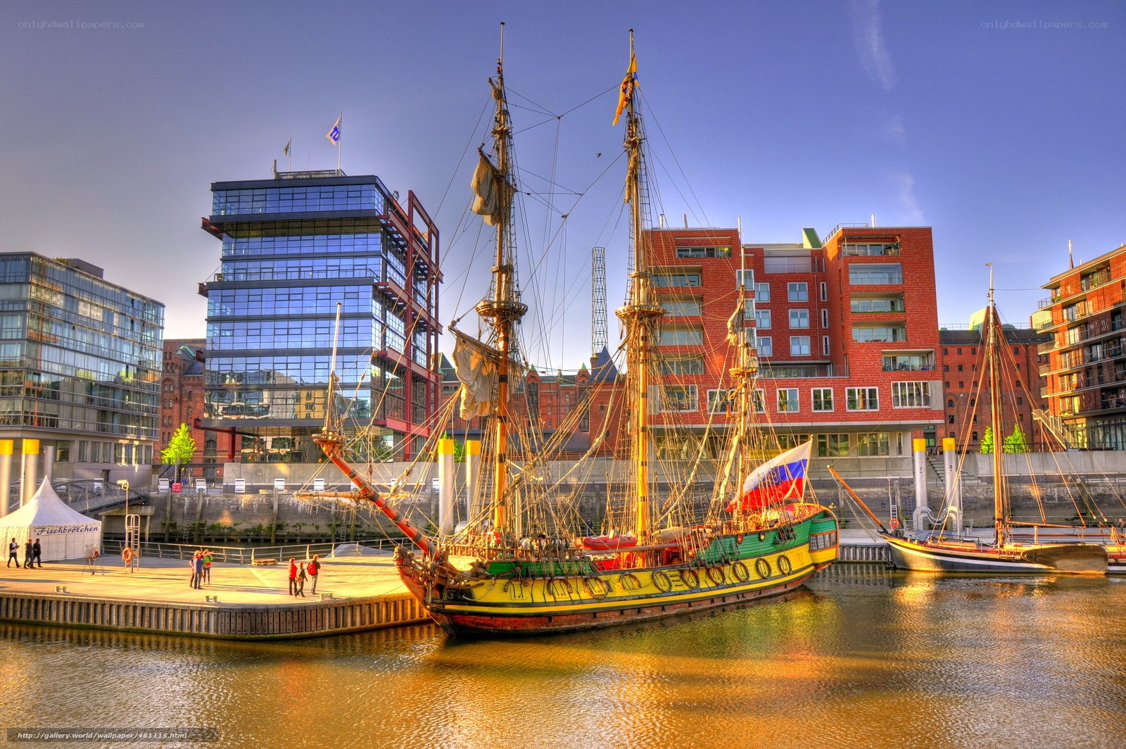 Historic ship in modern harbor