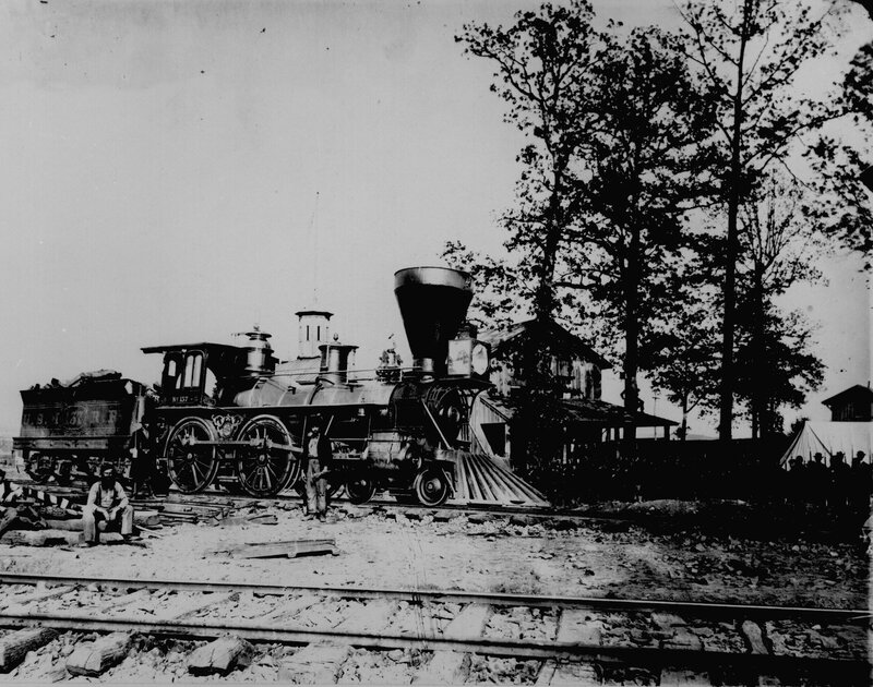 Historic steam locomotive at station
