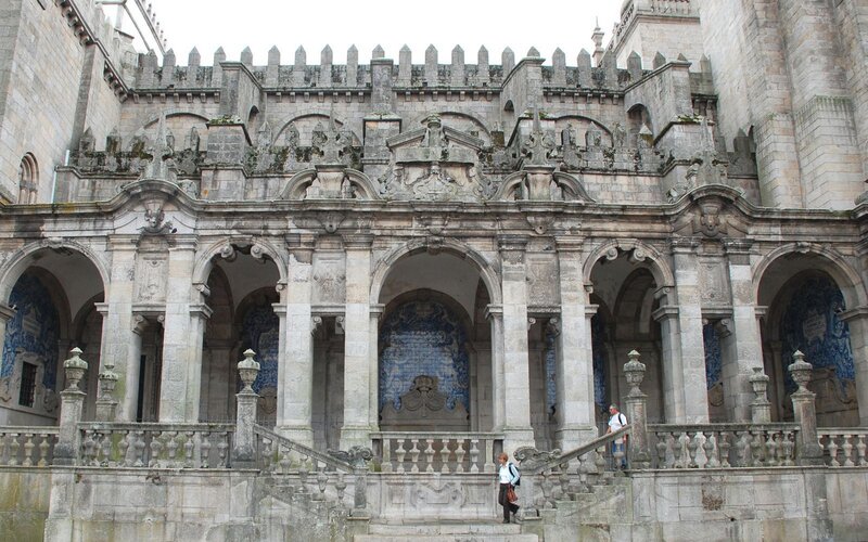 Historic stone building with arches