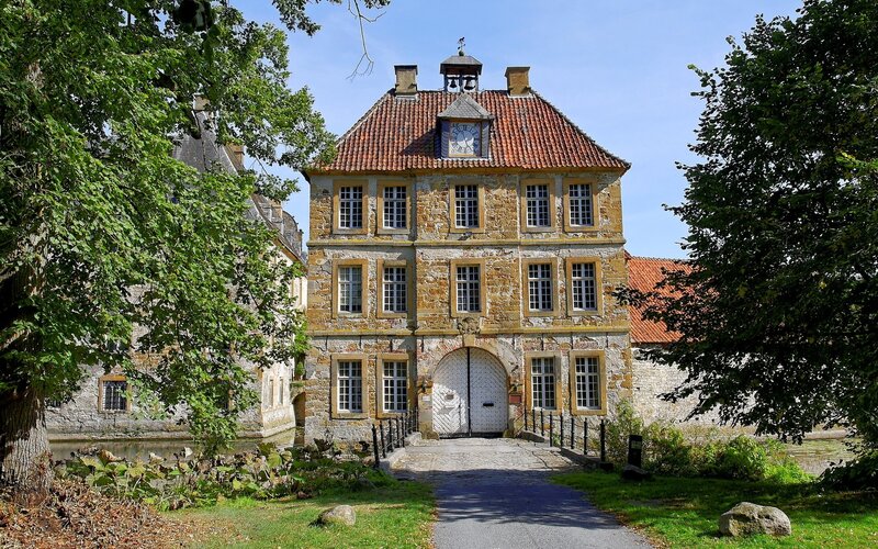 historic stone building with clock