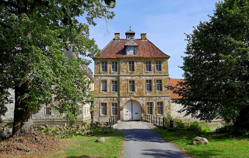 historic stone building with clock tower