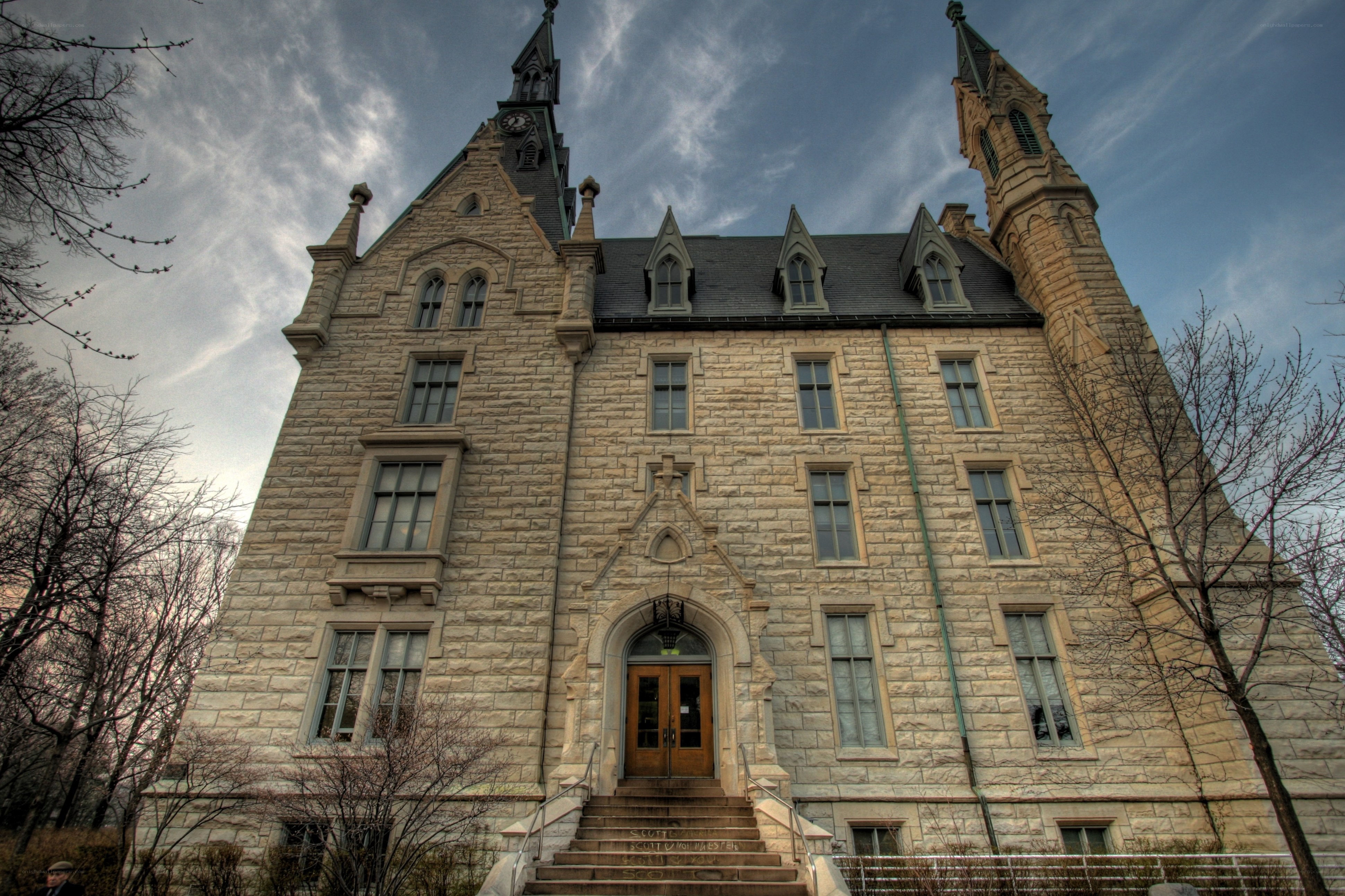 historic stone building with towers