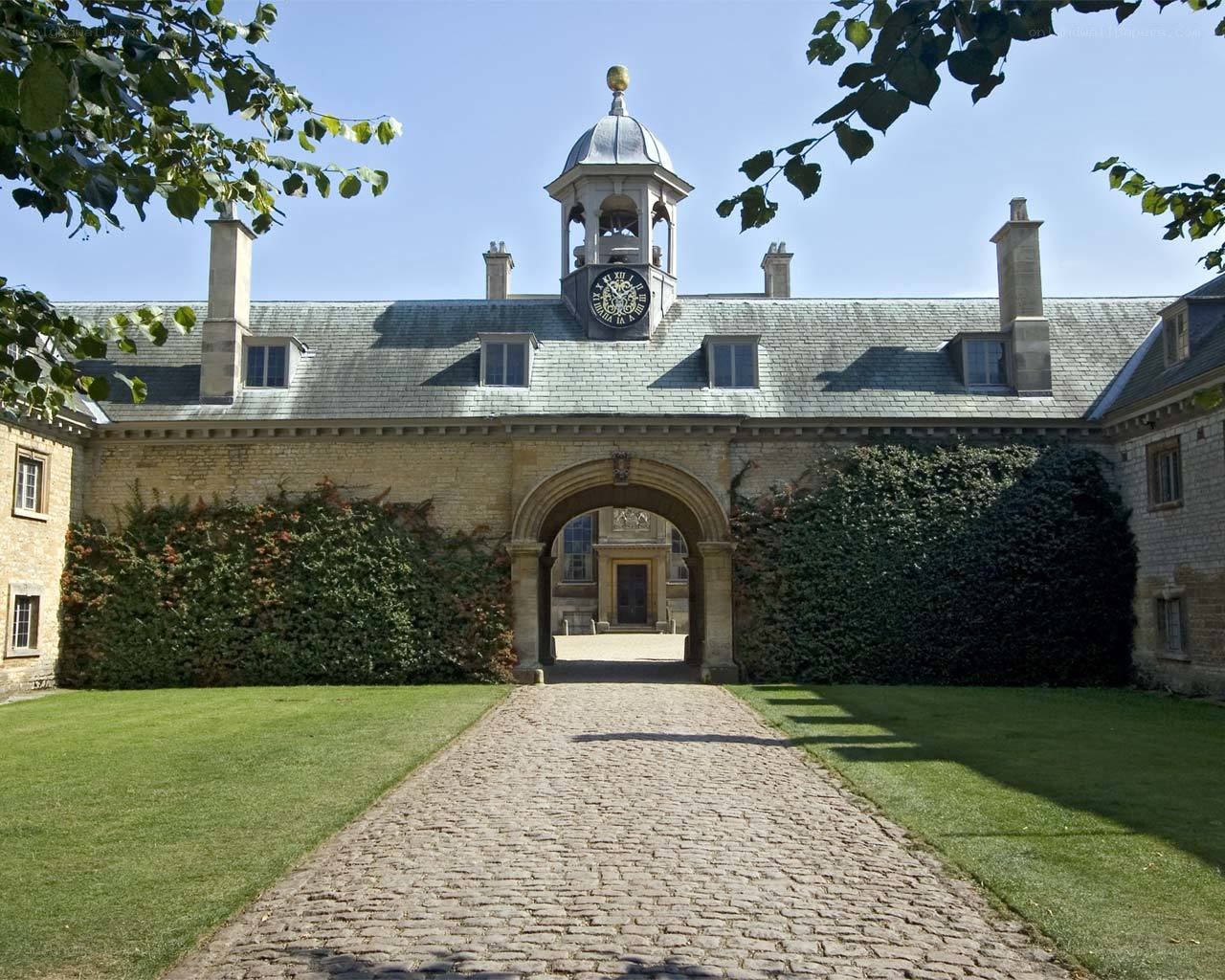 Historic stone gatehouse with clock tower