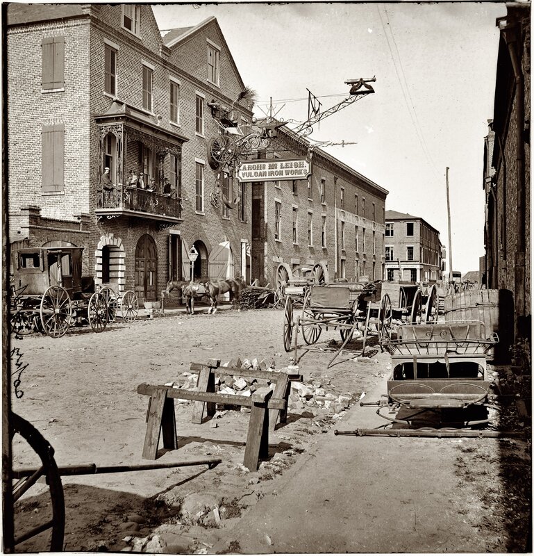 Historic street scene with ironworks sign
