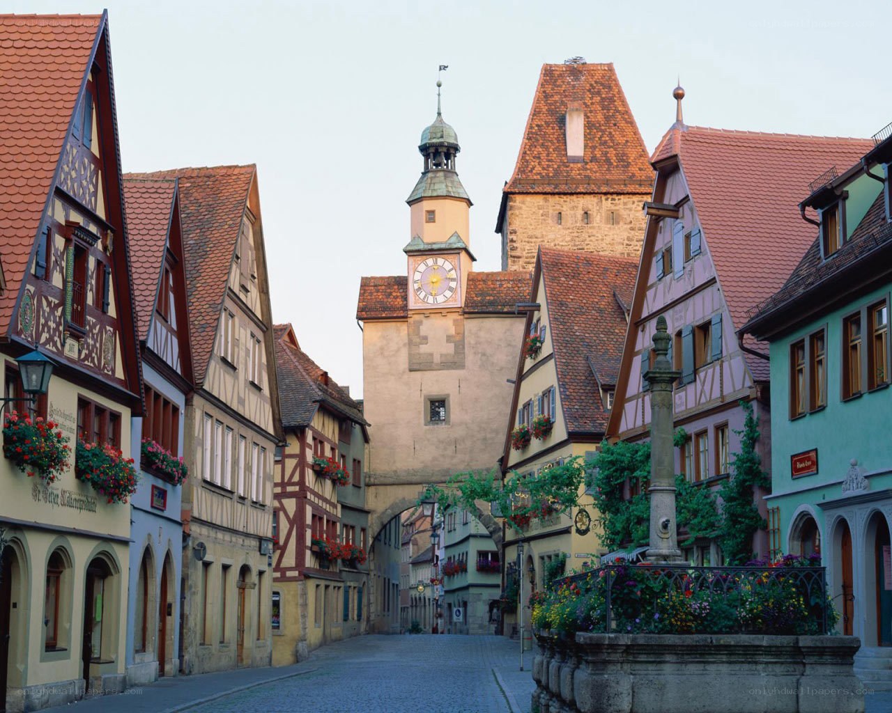 historic street with clock tower