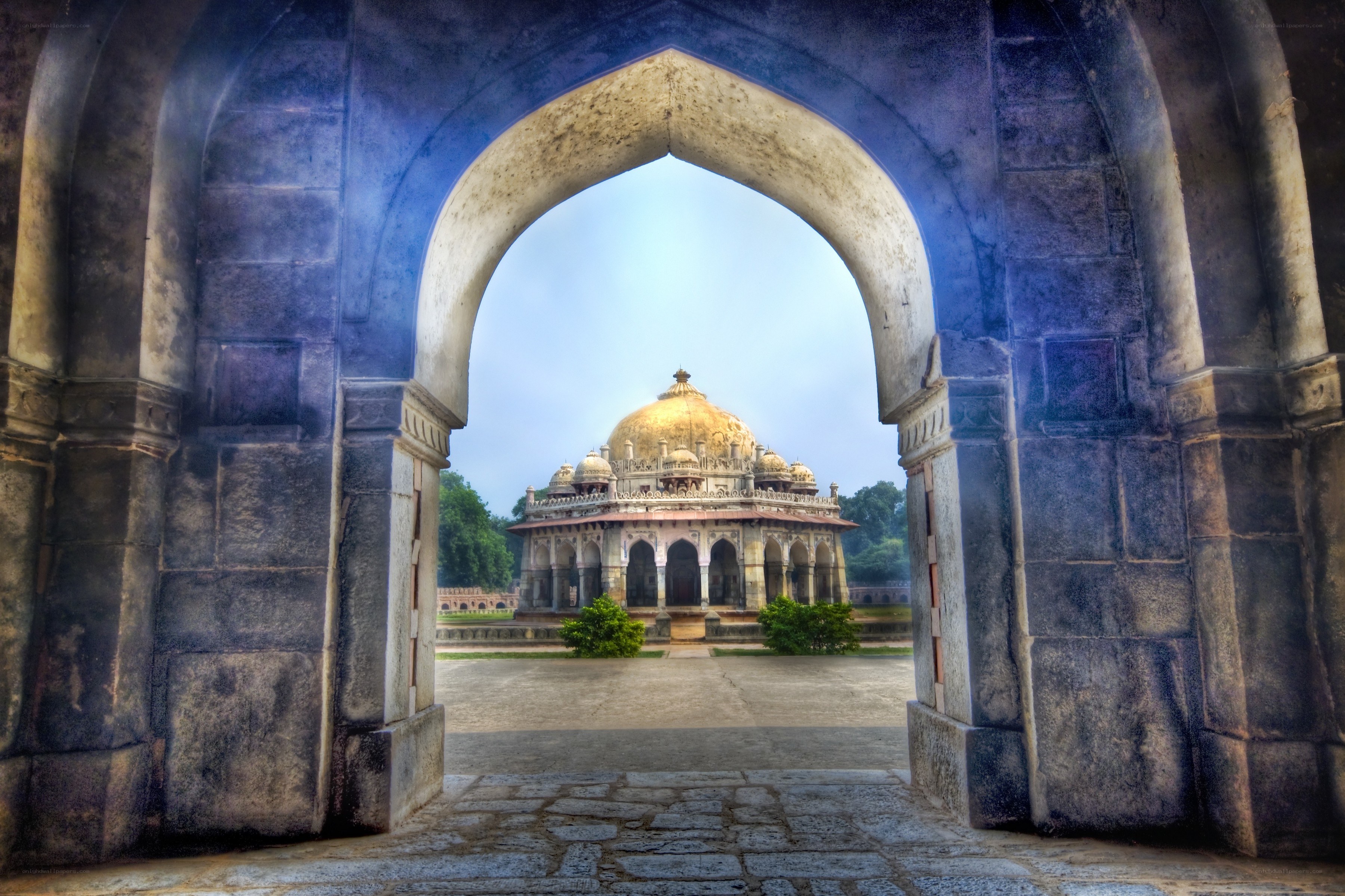 Historic tomb through an archway