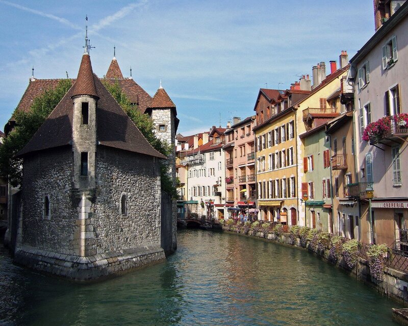 Historic tower on a canal in Annecy