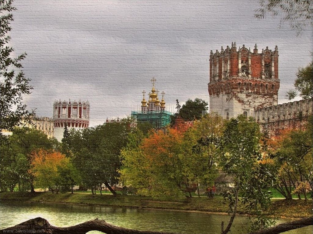 Historic towers and autumn trees