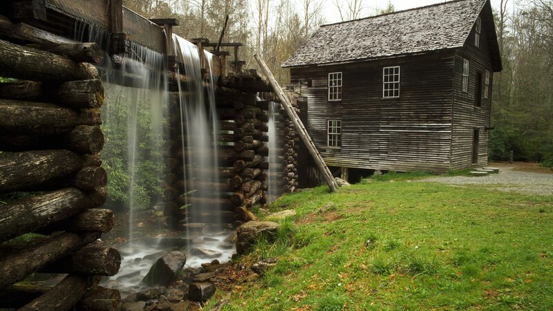 historic water mill in forest