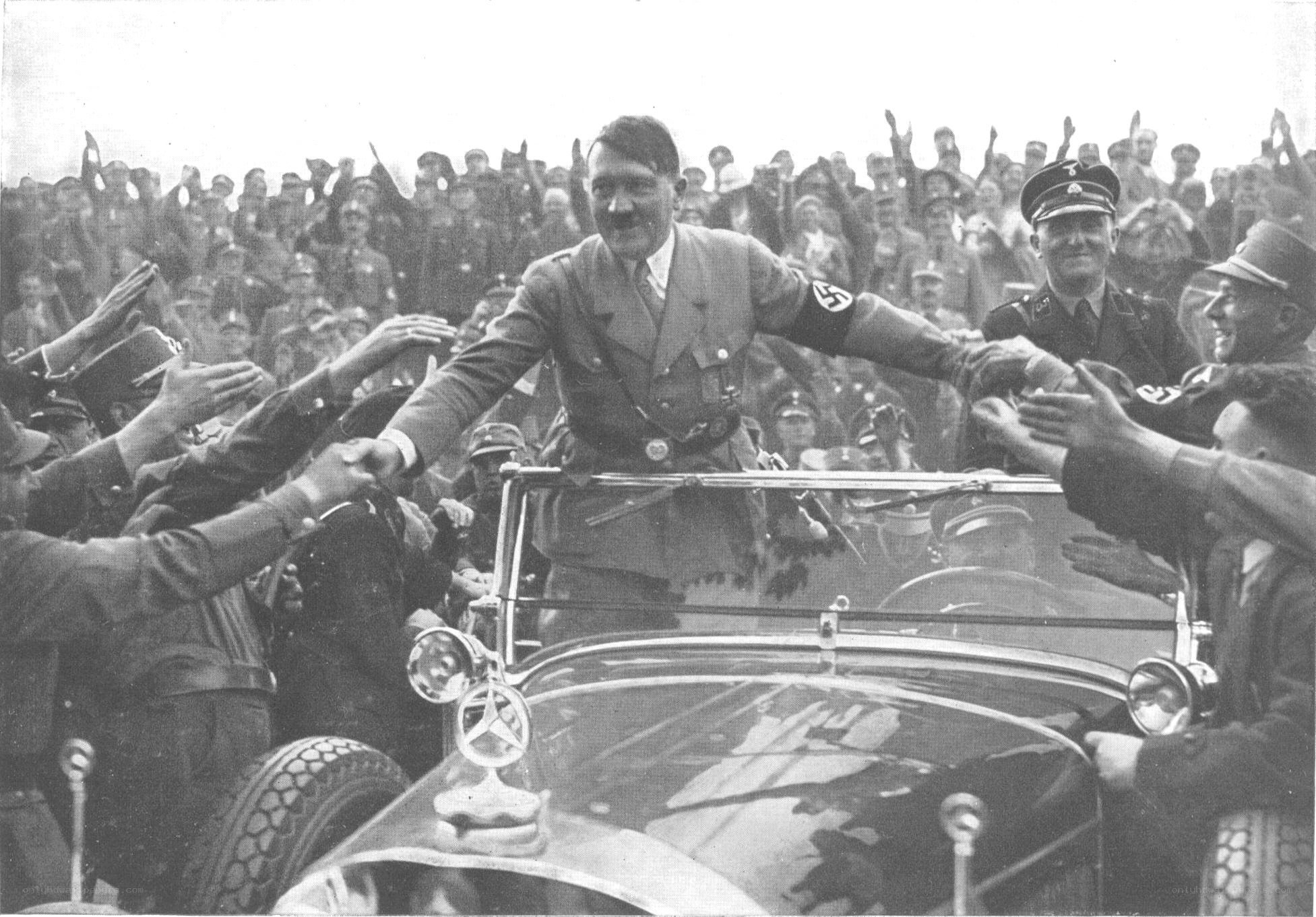 Hitler in car with crowd