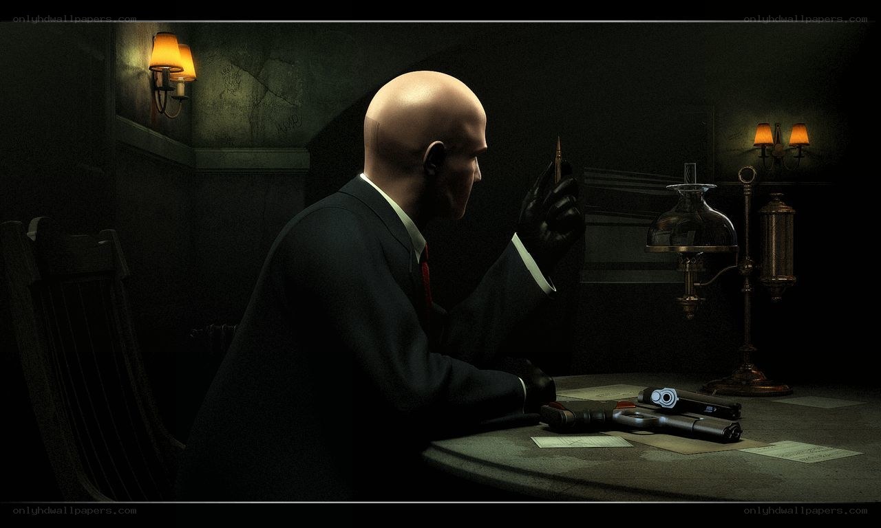 Hitman character at a desk