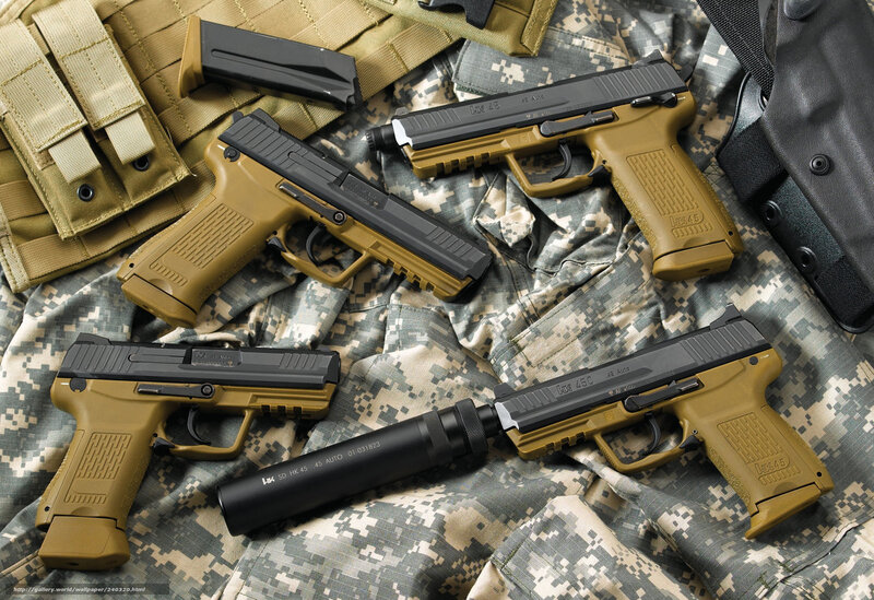HK 45 pistols on camouflage