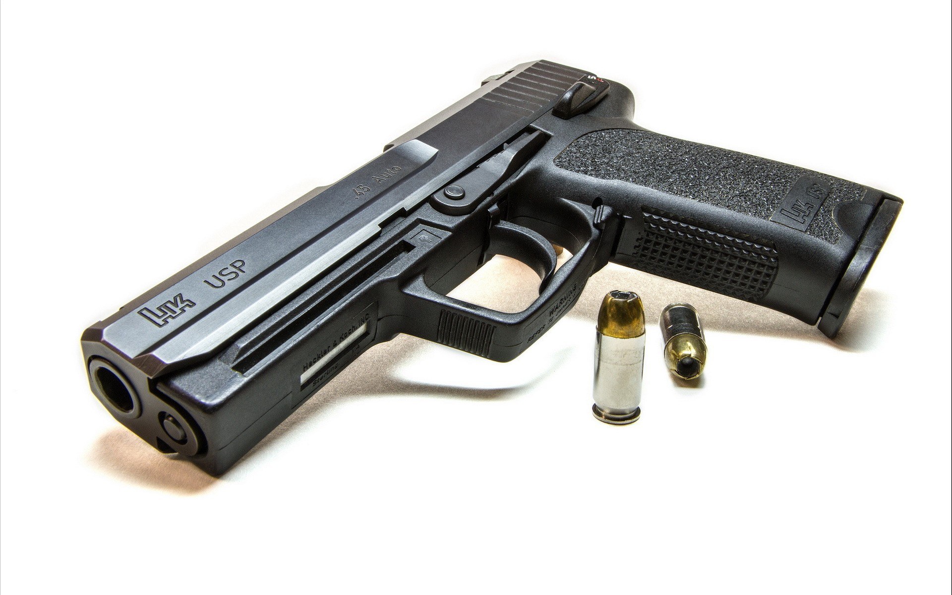 HK USP pistol with ammunition
