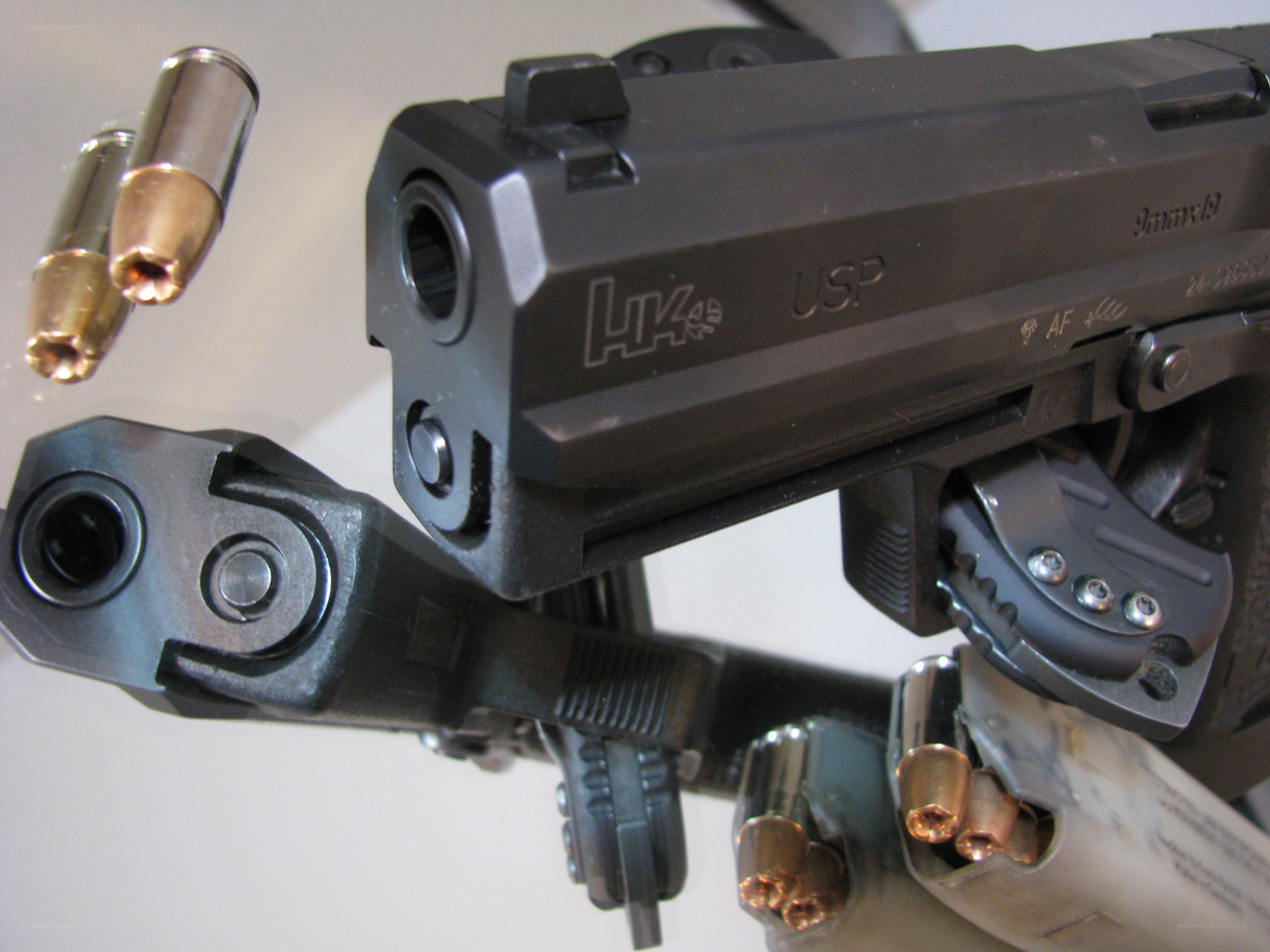 HK USP pistol with ammunition