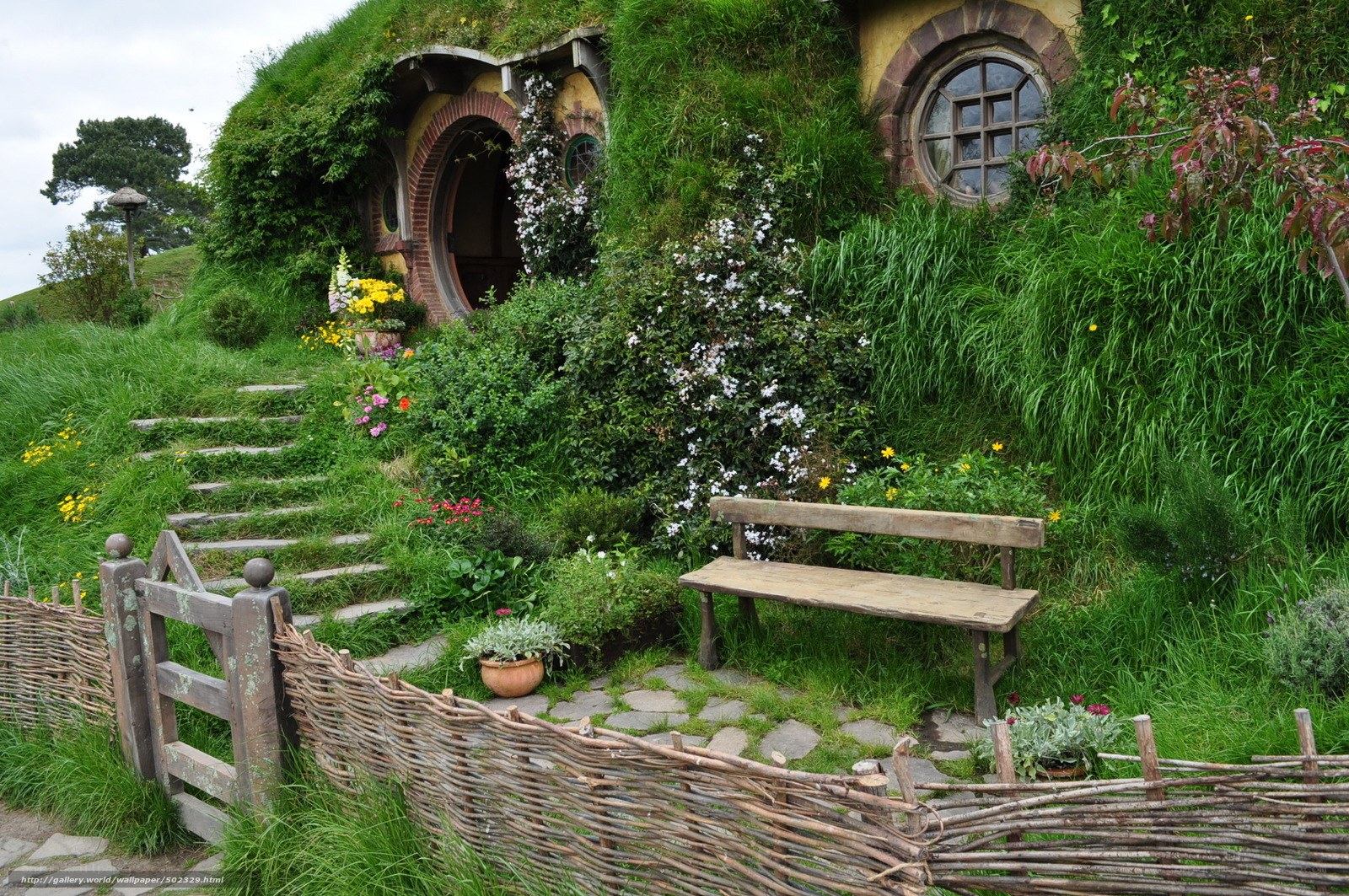 Hobbit hole in a lush garden