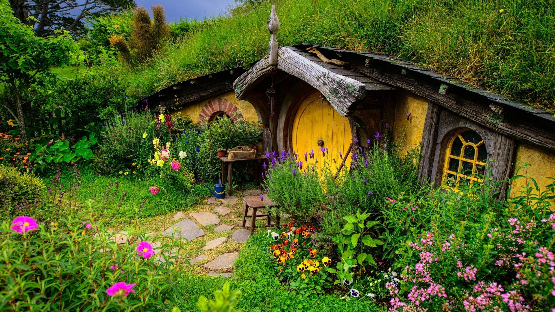 Hobbit house in a lush garden