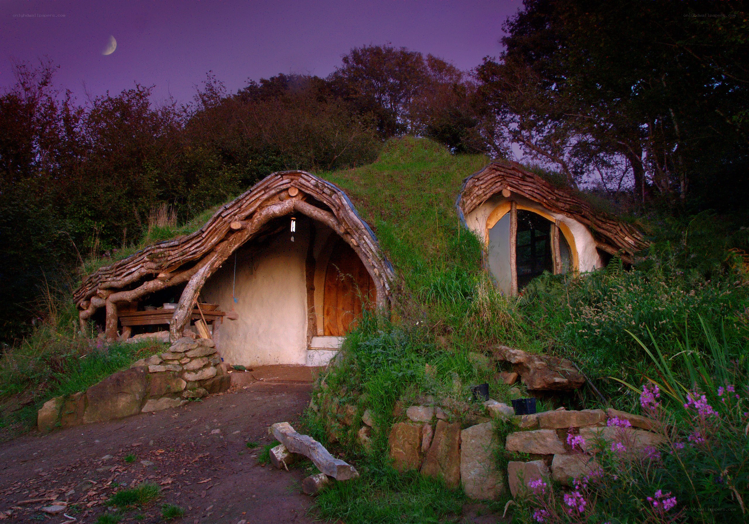 Hobbit-style homes at dusk