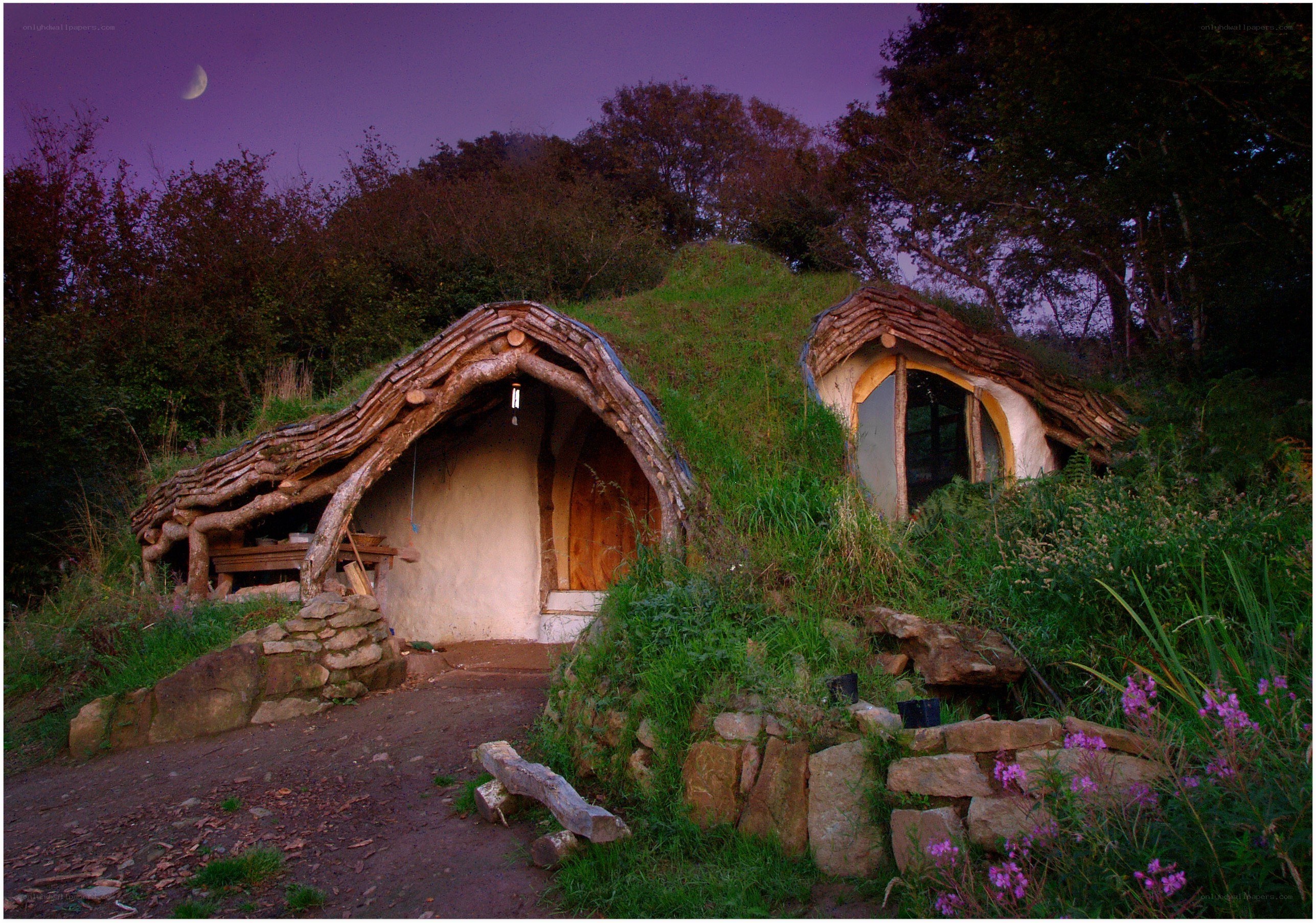 Hobbit-style homes at dusk