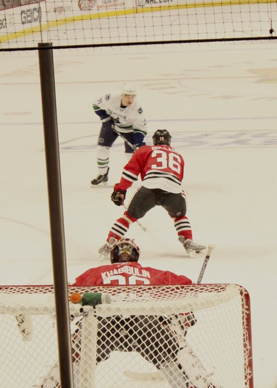 Hockey game action at goal