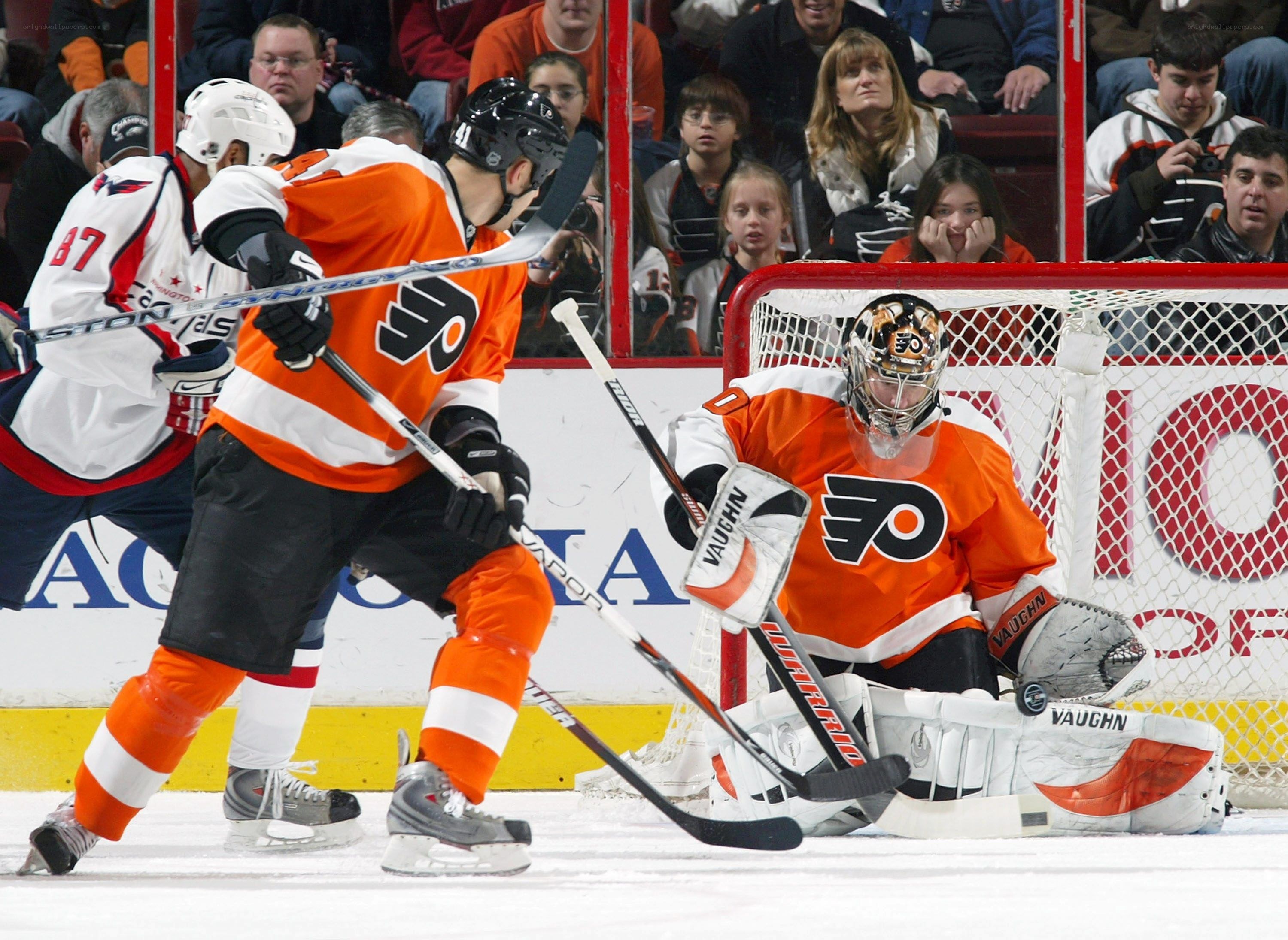 Hockey game action at rink