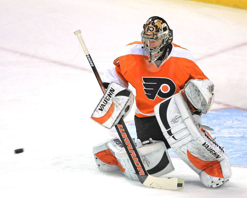 hockey goalie in action