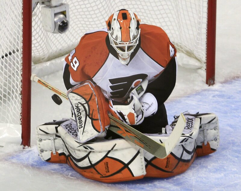 hockey goalie in action