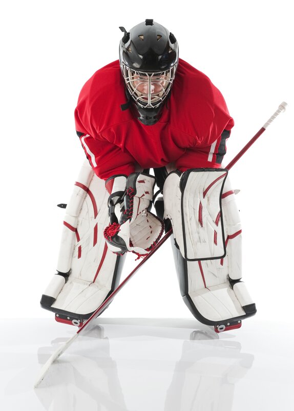 hockey goalie in red uniform