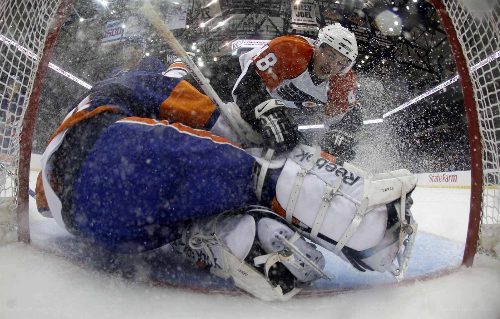 Hockey goalie makes a save