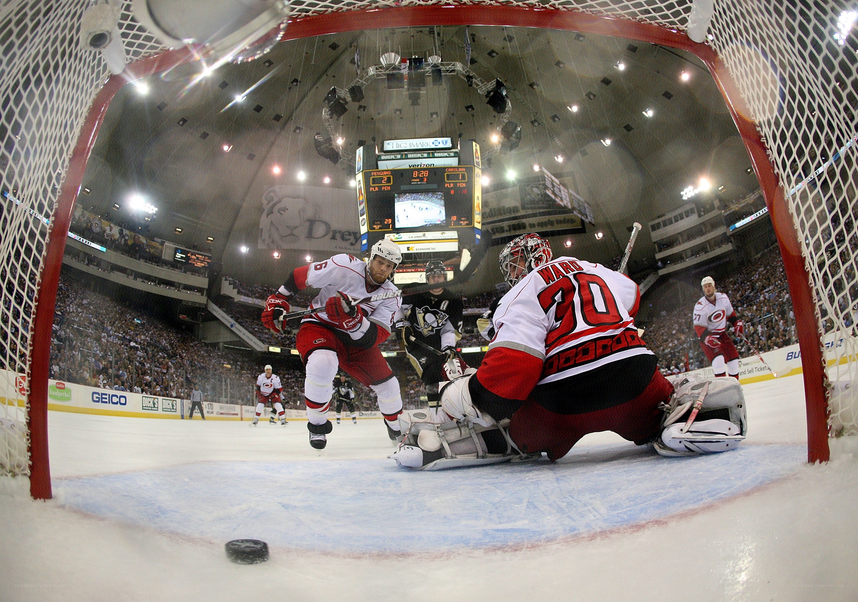 Hockey goalie makes save