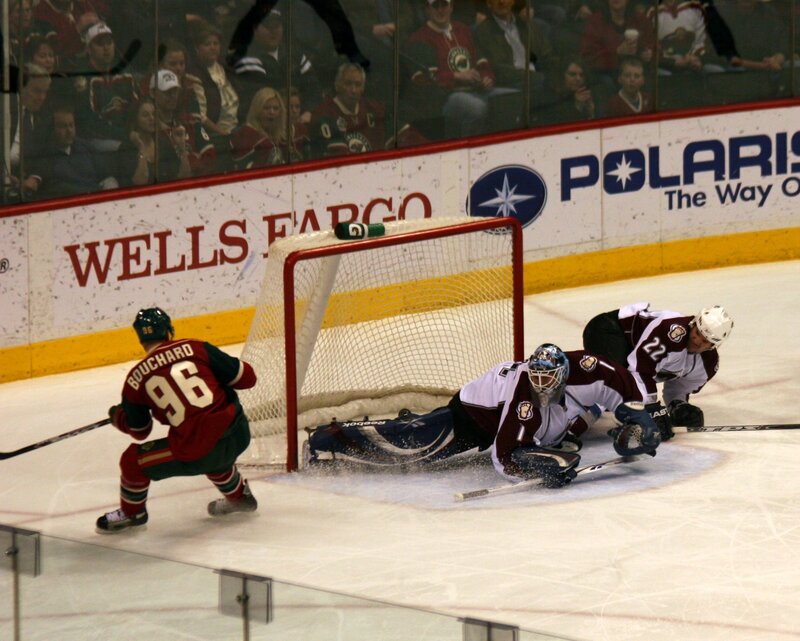 hockey goalie making a save