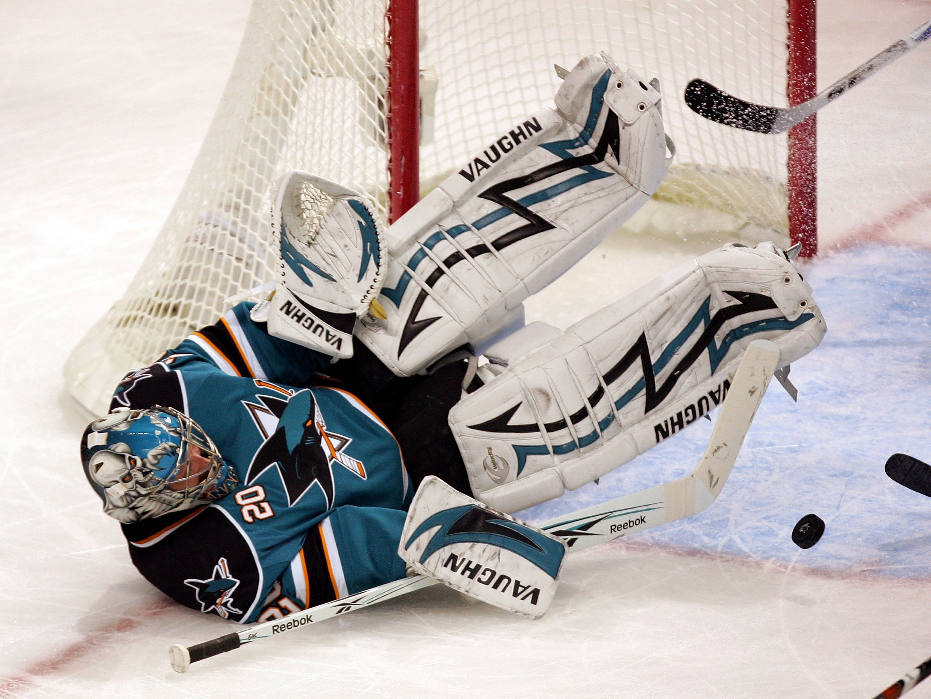 hockey goalie making a save