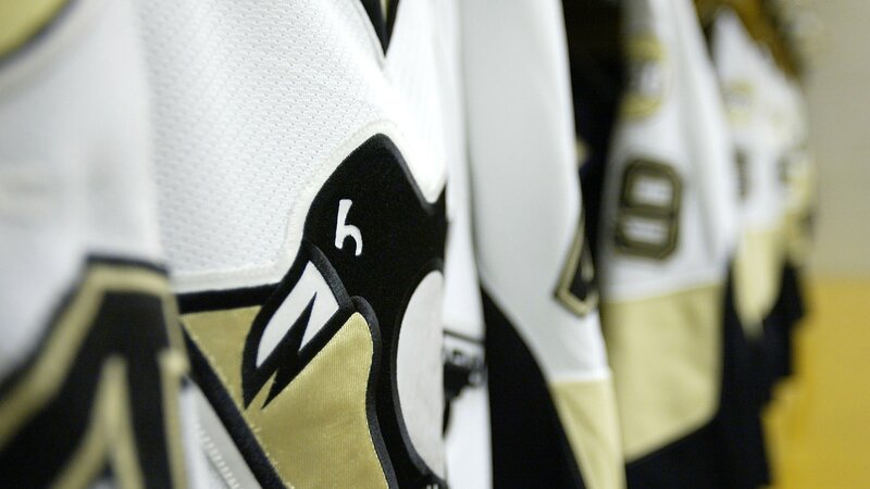 Hockey Jerseys in a Row
