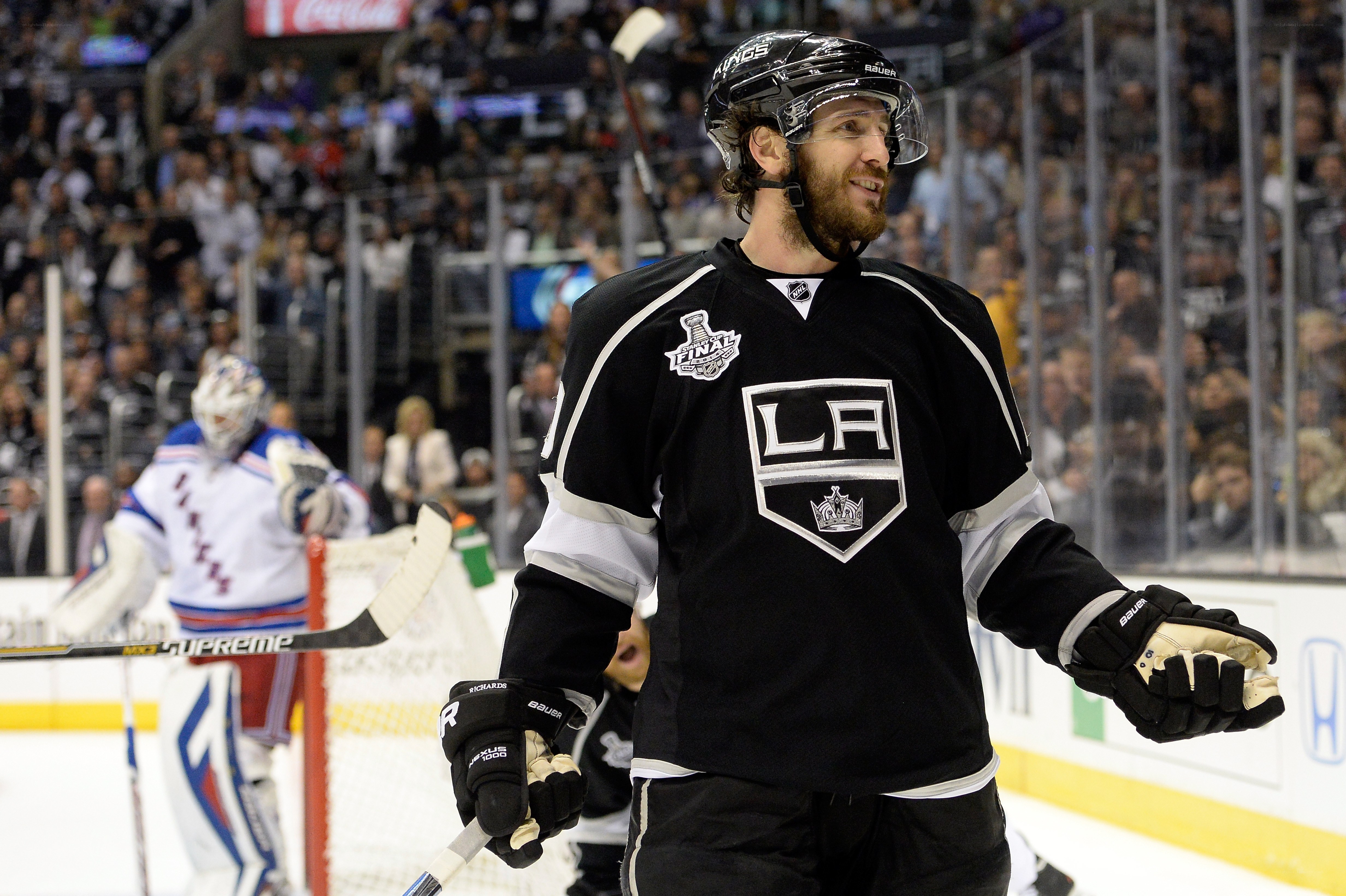 hockey player celebrating on ice