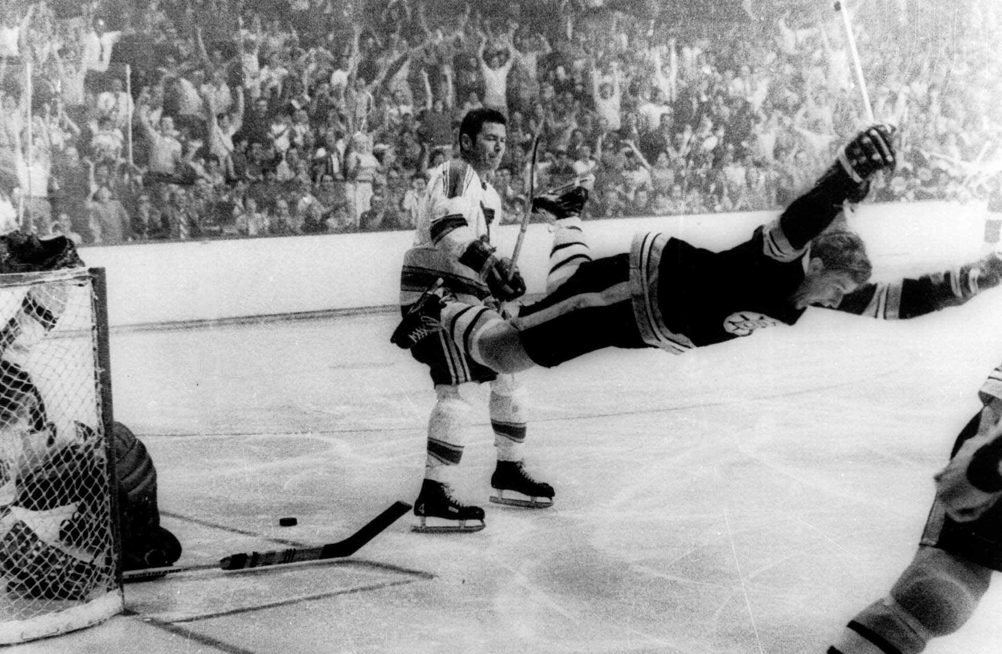 Hockey player falls on ice