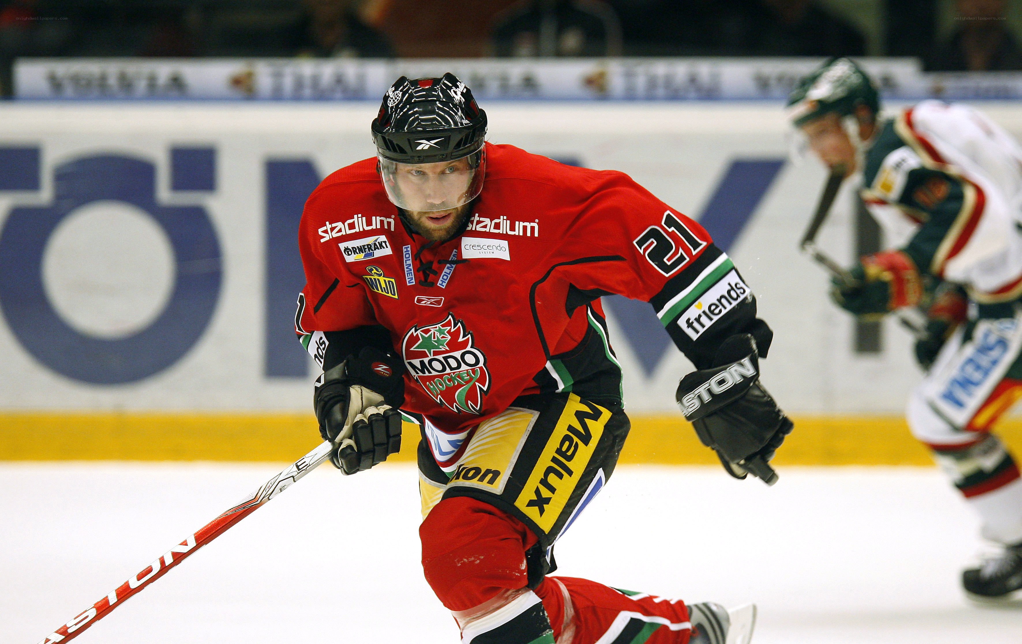 Hockey player in red uniform
