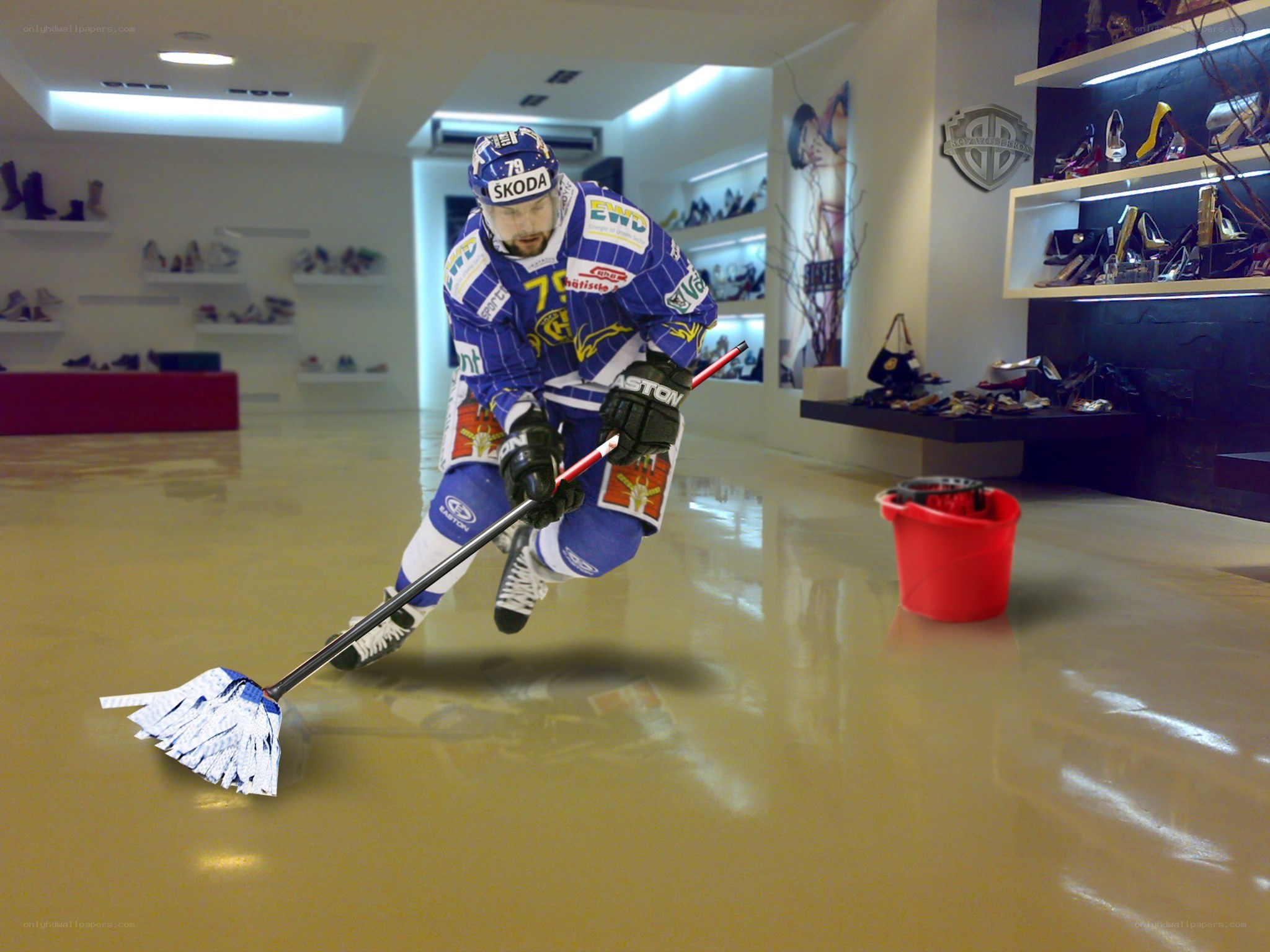 Hockey player mopping floor