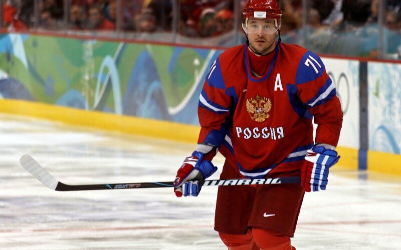Hockey Player on Ice — Red