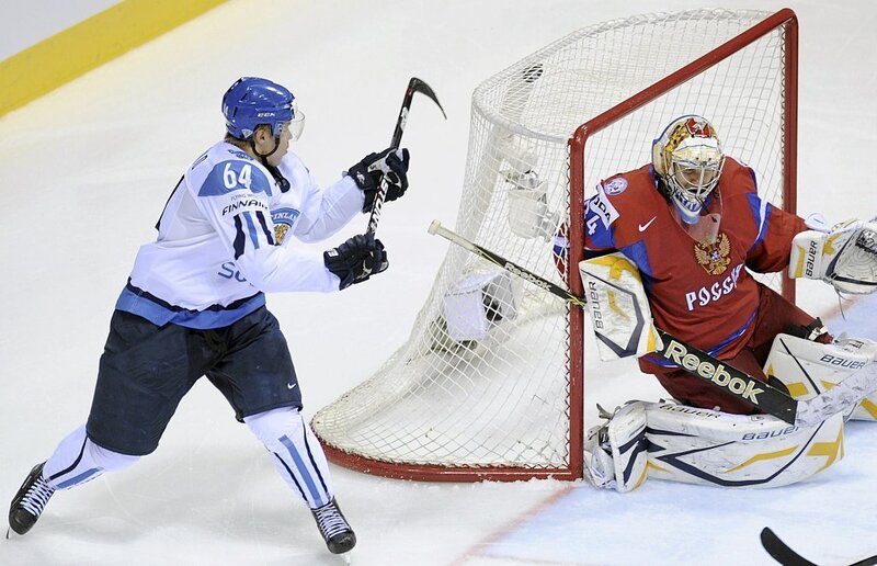 Hockey Player Shooting