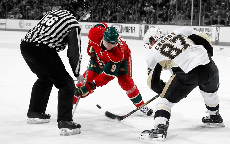 Hockey Players Battling for Puck — Red