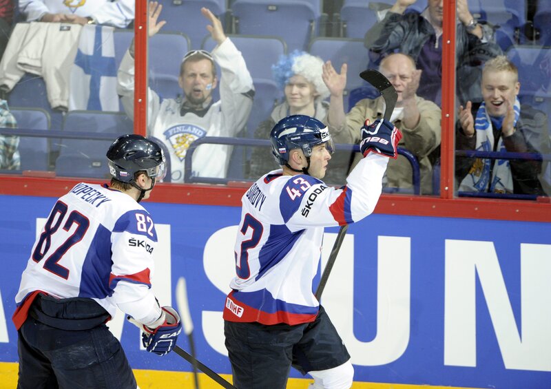 Hockey players celebrating goal