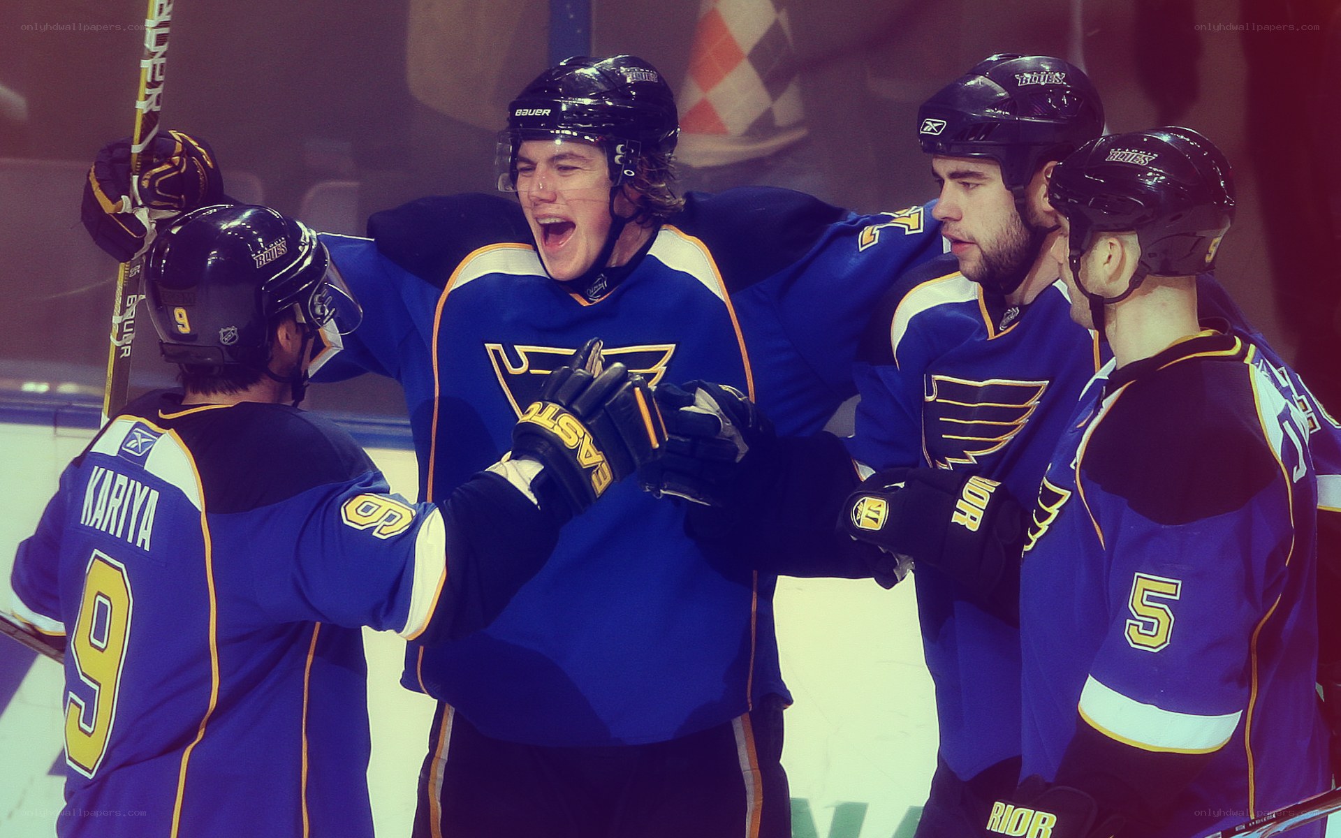 Hockey players celebrating goal