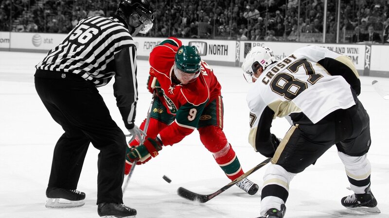 Hockey Players Fighting for Puck — White, Intense