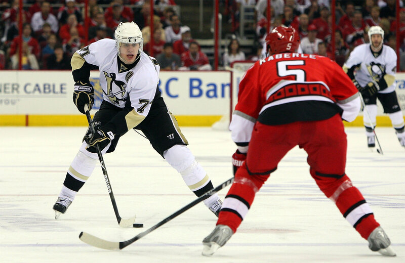 Hockey players in action on ice