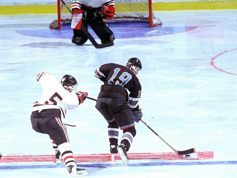 Hockey players in action on ice