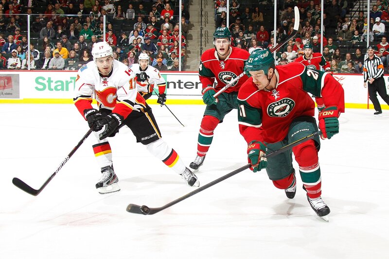 Hockey players in action on ice