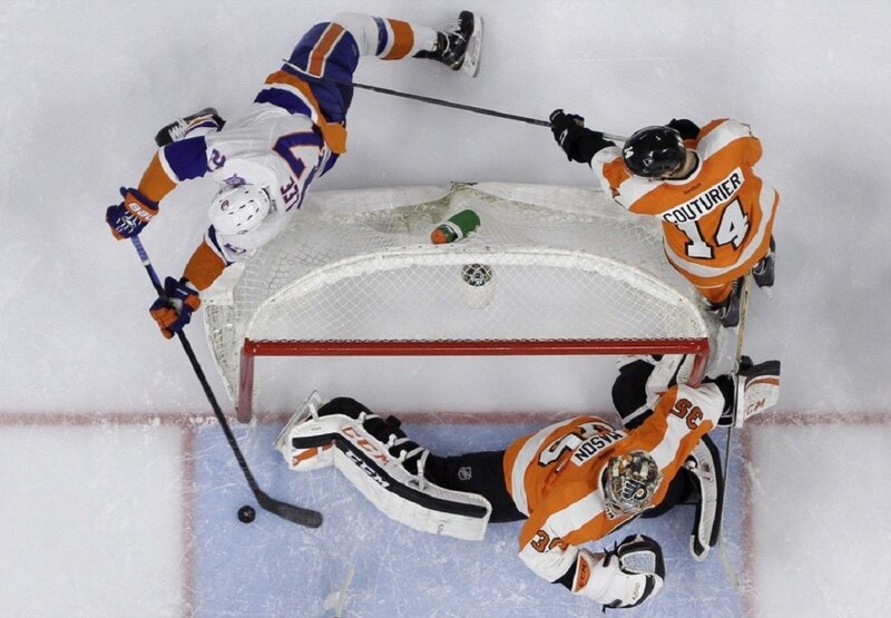 Hockey Players Near Goal