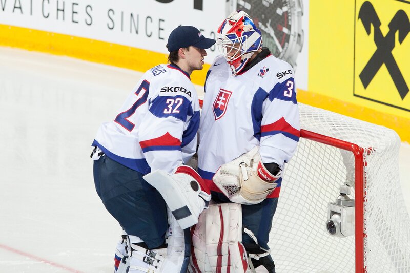 Hockey Players on Ice — White, Focused