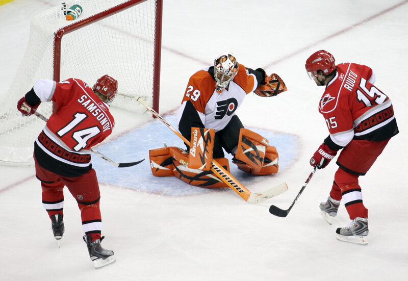 Hockey Players on Ice — White, Intense, Photograph, Goalie